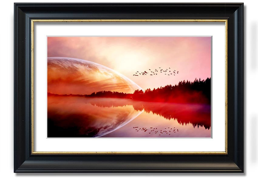 A beautifully framed print of a serene sunrise over a tranquil lake, showcasing vibrant colors and a peaceful landscape.