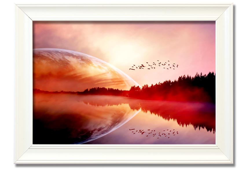 A beautifully framed print of a serene sunrise over a tranquil lake, showcasing vibrant colors and a peaceful landscape.