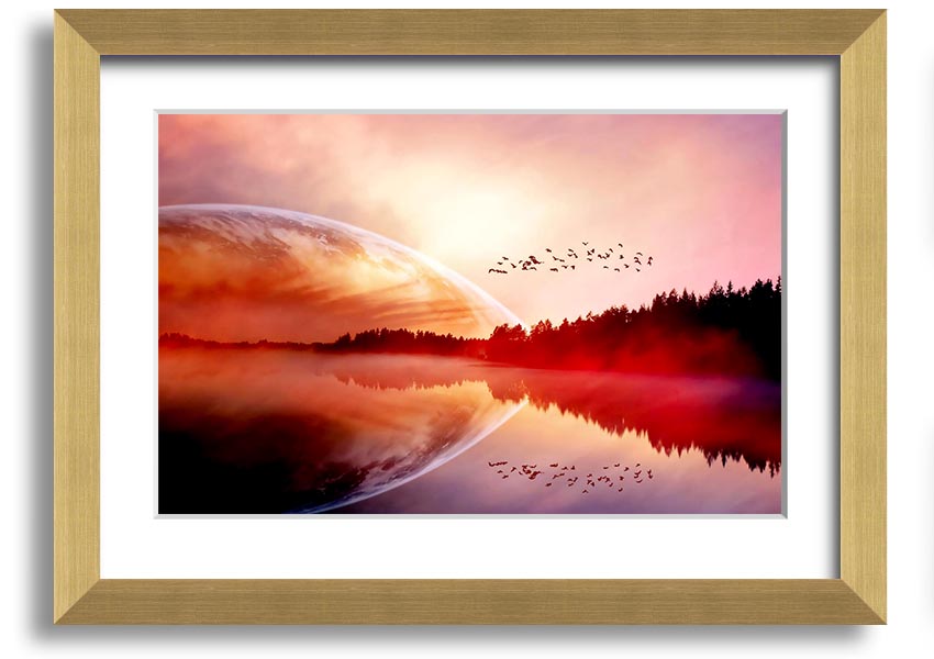 A beautifully framed print of a serene sunrise over a tranquil lake, showcasing vibrant colors and a peaceful landscape.