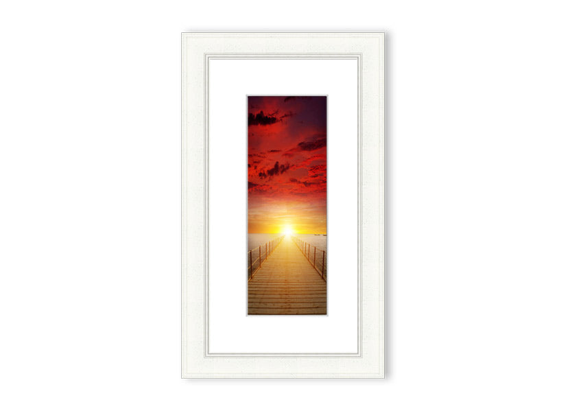 Framed print of a sunset over a boardwalk, showcasing vibrant colors and serene scenery, available in multiple frame options.