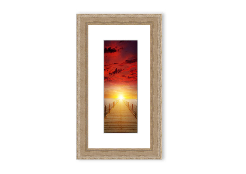 Framed print of a sunset over a boardwalk, showcasing vibrant colors and serene scenery, available in multiple frame options.