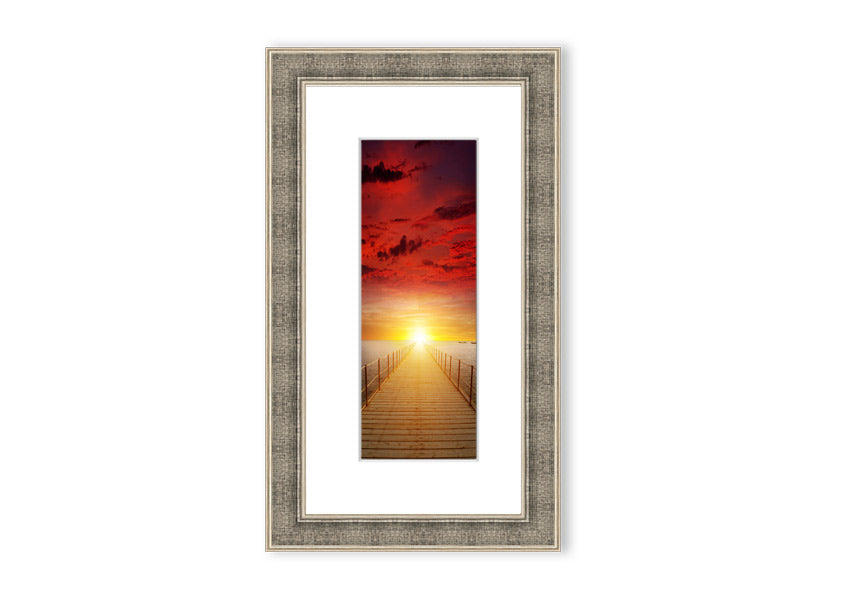 Framed print of a sunset over a boardwalk, showcasing vibrant colors and serene scenery, available in multiple frame options.