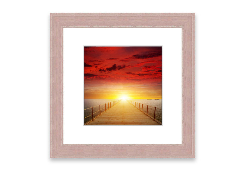 Framed print of a sunset over a boardwalk, showcasing vibrant colors and serene scenery, available in multiple frame options.