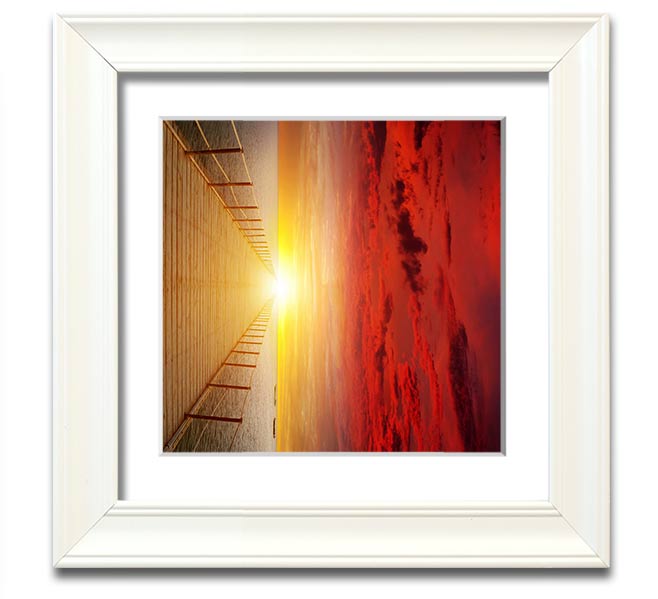 A beautifully framed print of a sunset over a boardwalk, showcasing vibrant colors and intricate details.