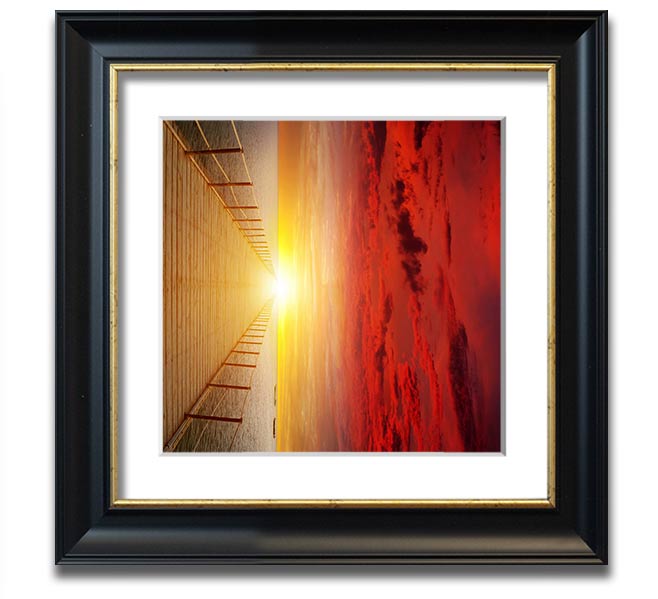 A beautifully framed print of a sunset over a boardwalk, showcasing vibrant colors and intricate details.