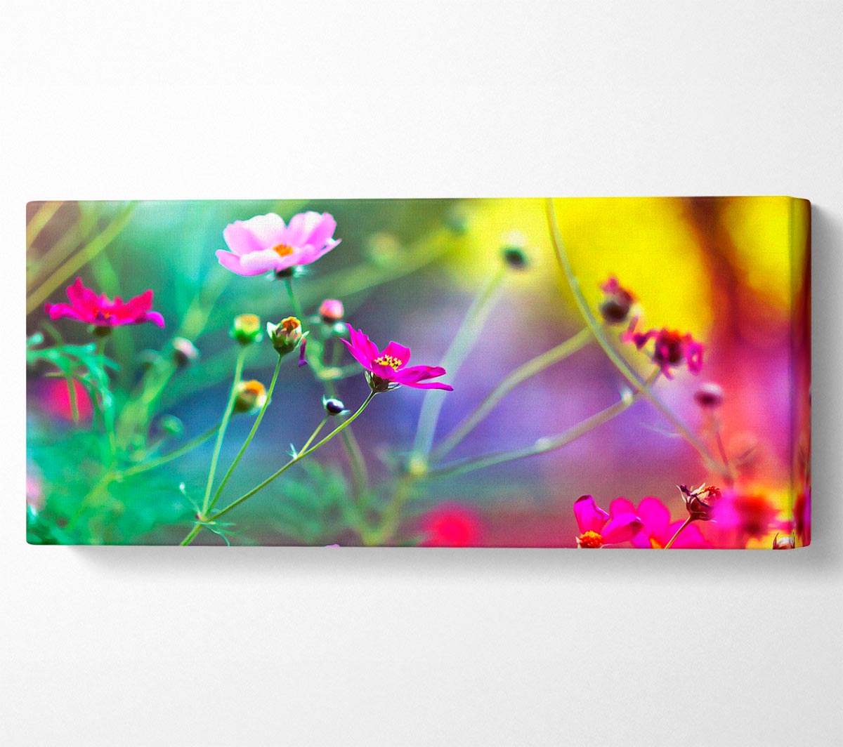 A vibrant canvas print of wildflowers mounted on a sturdy box frame, ready to hang.