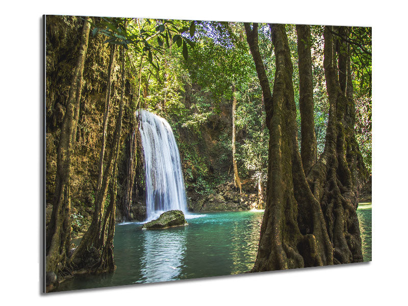 A vibrant artwork of an Amazon jungle waterfall printed on brushed aluminium dibond, showcasing lush greenery and flowing water.