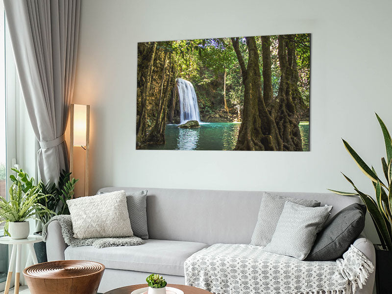 A vibrant artwork of an Amazon jungle waterfall printed on brushed aluminium dibond, showcasing lush greenery and flowing water.