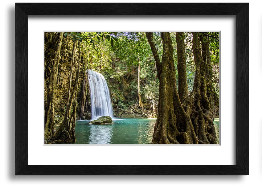 Framed print of a stunning Amazon jungle waterfall, showcasing vibrant greenery and cascading water, available in various frame colors.