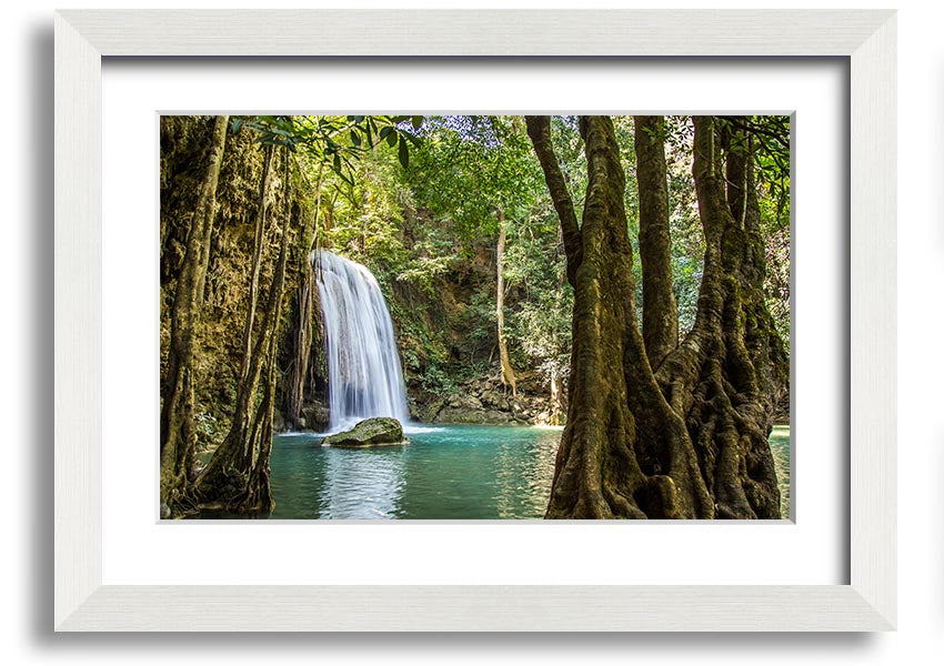 Framed print of a stunning Amazon jungle waterfall, showcasing vibrant greenery and cascading water, available in various frame colors.