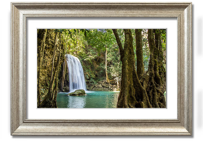 Framed print of a stunning Amazon jungle waterfall, showcasing vibrant greenery and cascading water, available in various frame colors.