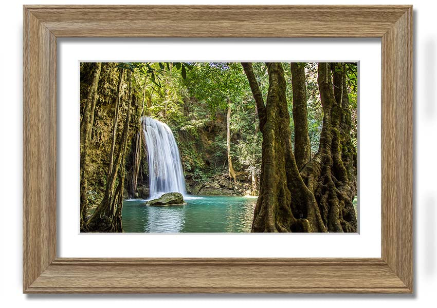 Framed print of a stunning Amazon jungle waterfall, showcasing vibrant greenery and cascading water, available in various frame colors.