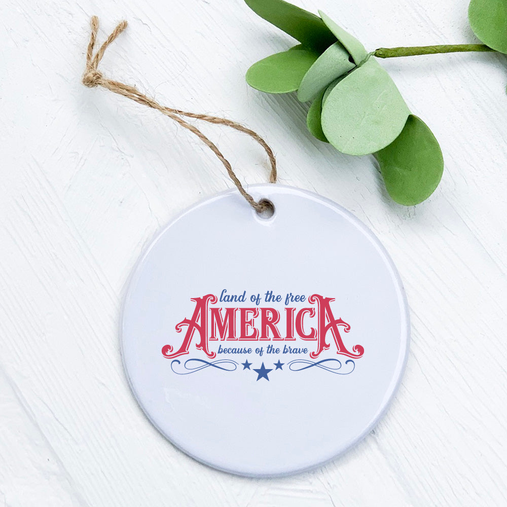 America Land of the Free porcelain ornament featuring original design, 2.75 inches in diameter, with a smooth gloss finish.