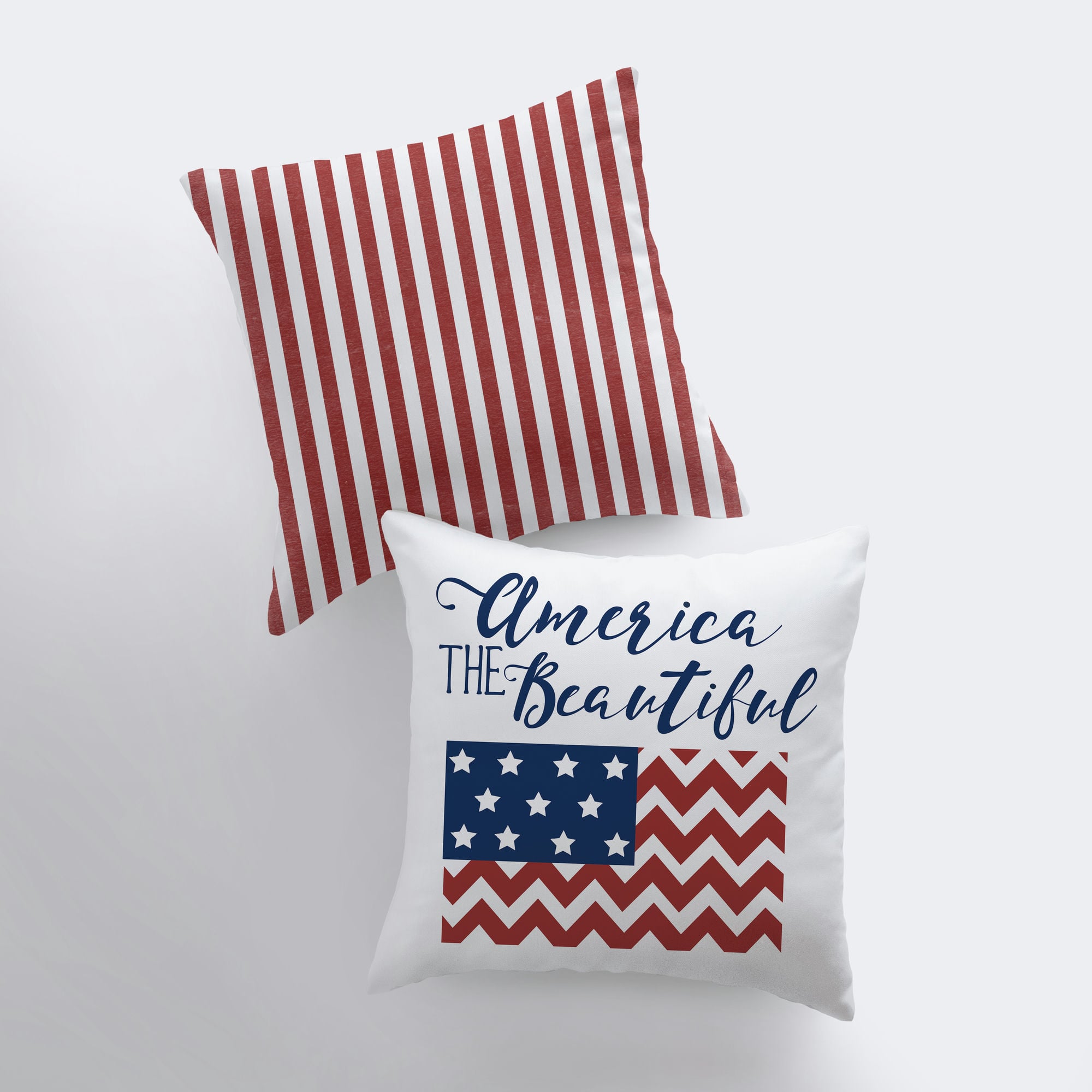 America the Beautiful pillow cover featuring 'God Bless America' design with red stripes on the back, handmade in America.