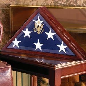 American Burial Flag Box made of solid walnut with beveled glass front, designed to hold a 5' x 9.5' burial flag, featuring the great seal of the United States.