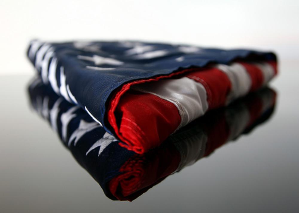 American Flag 3ft x 5ft made of heavy cotton with sewn stripes and embroidered stars, ideal for indoor display.