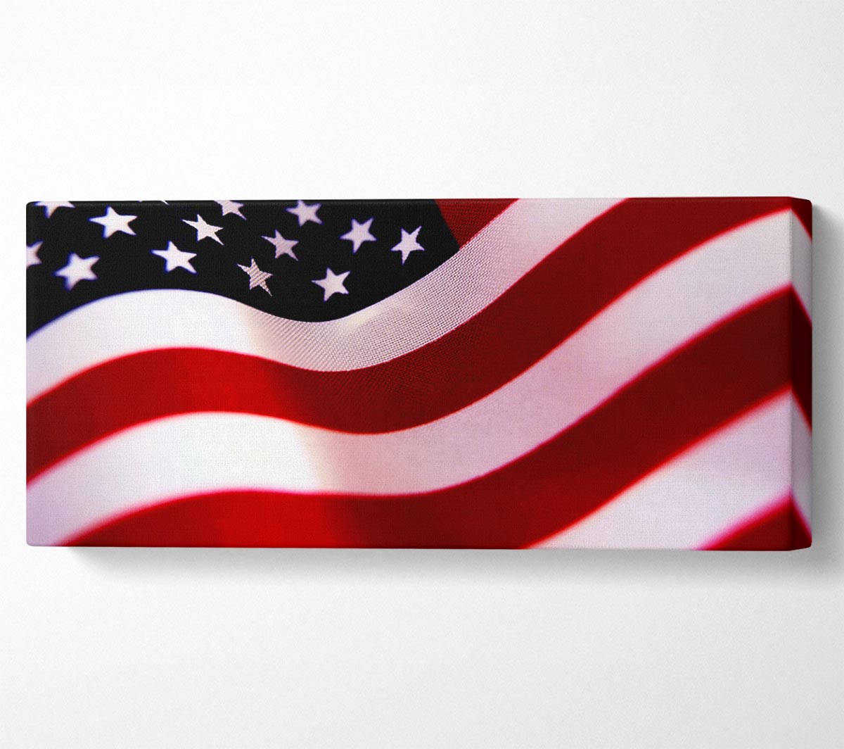 A vibrant American Flag canvas mounted on a sturdy box frame, ready to hang on a wall.