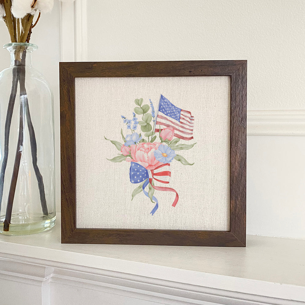 American Flag Bouquet framed sign with a wood frame, featuring a linen-look background and eco-friendly ink printing.