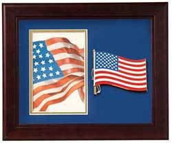 American Patriotic Vertical Picture Frame featuring a large flag medallion and elegant blue matting with gold trim.