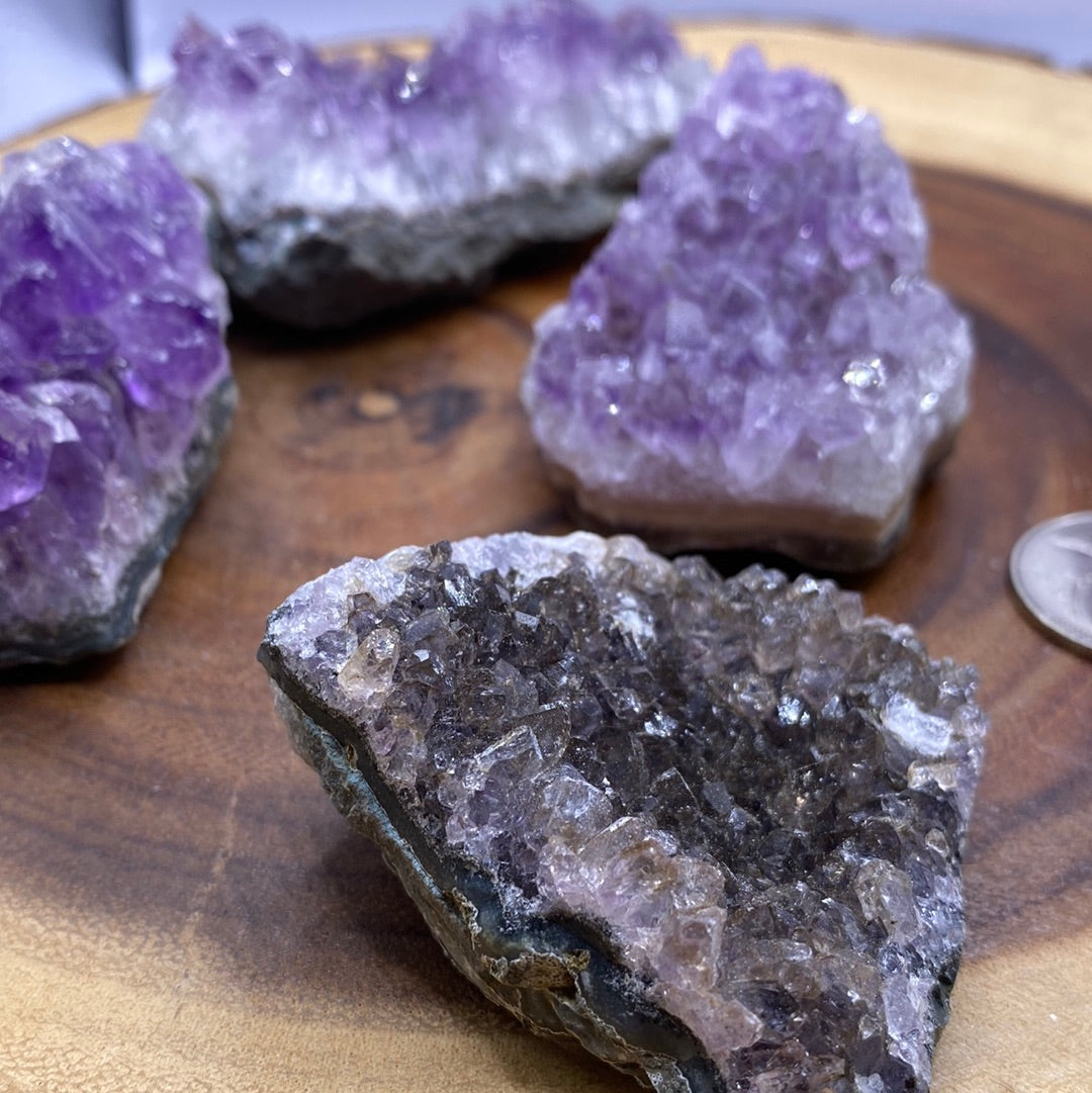 A beautiful Amethyst Druzy Cluster showcasing sparkling purple crystals, radiating positive energy and light.