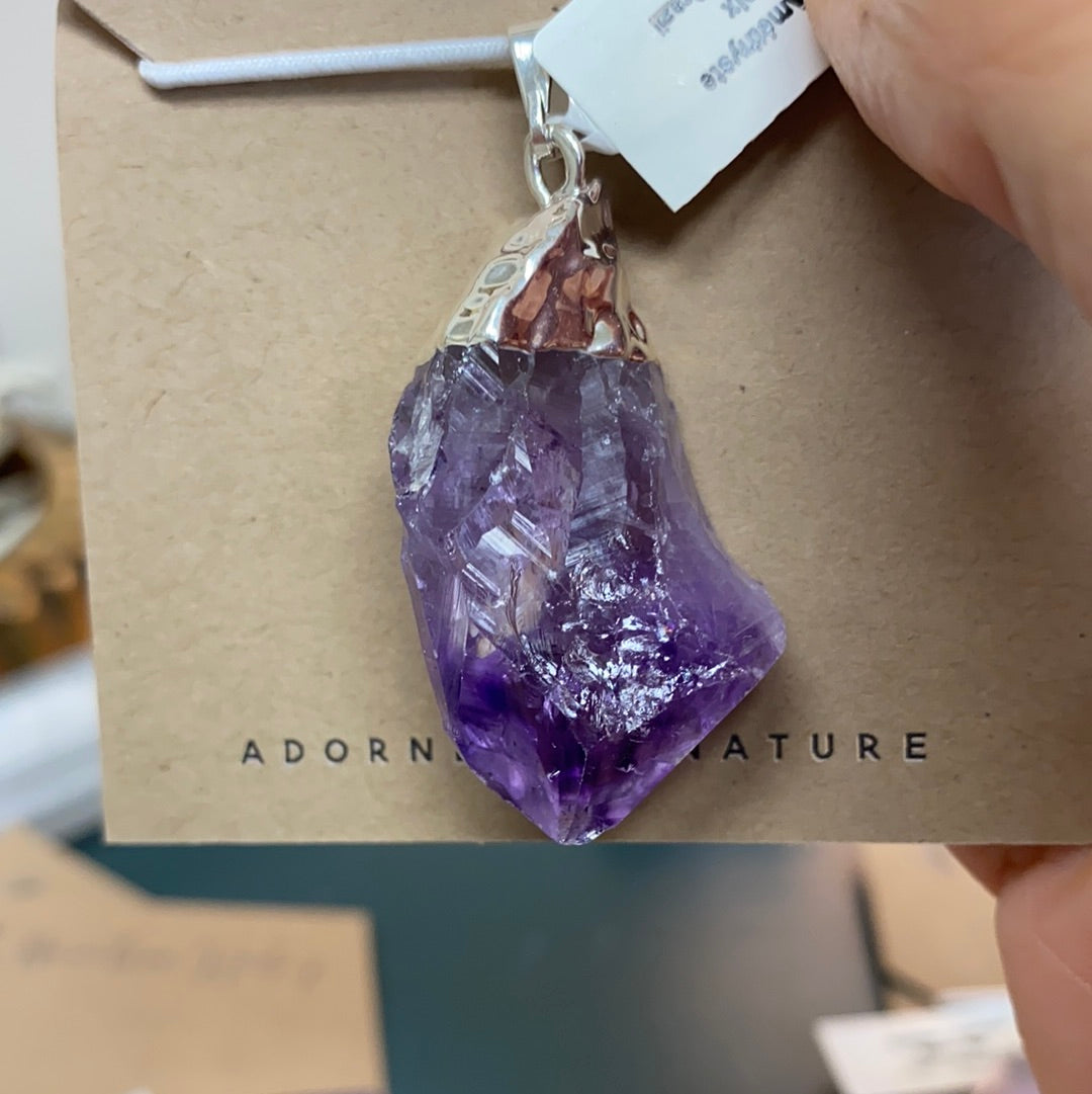 Amethyst Rough Cut Pendant featuring natural Brazilian amethyst points with a silver coating, elegantly designed for beauty and healing.