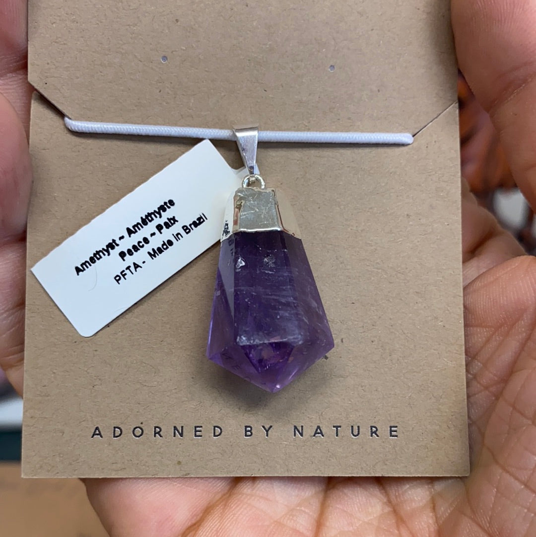 Amethyst Teardrop Faceted Pendant showcasing its beautiful purple hue and elegant teardrop shape, perfect for healing and style.