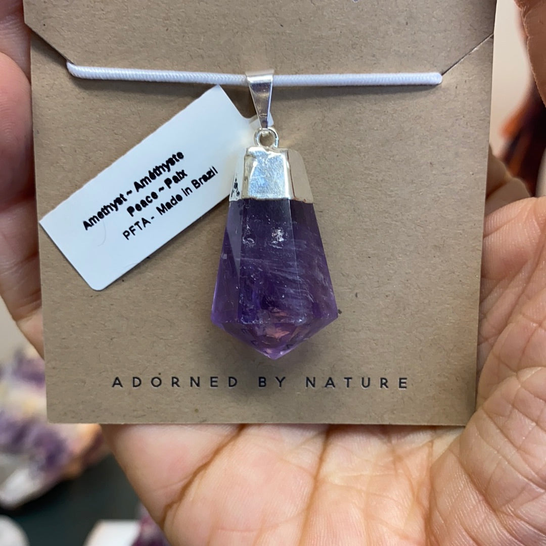 Amethyst Teardrop Faceted Pendant showcasing its beautiful purple hue and elegant teardrop shape, perfect for healing and style.