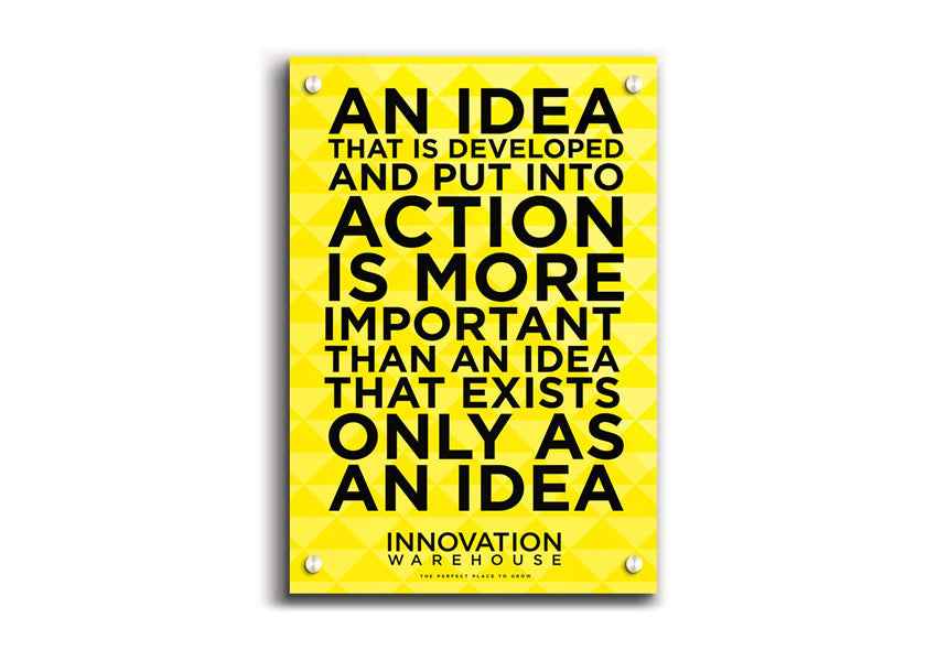 An Idea Put Into Action acrylic print on a wall, showcasing vibrant colors and modern design.