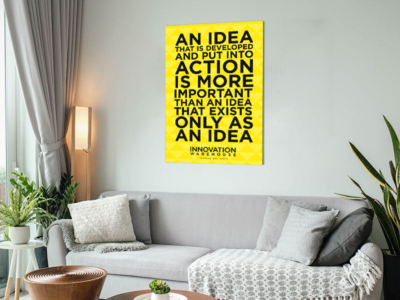 A modern art piece titled 'An Idea Put Into Action' printed on brushed aluminium dibond, showcasing vibrant colors and sharp details.