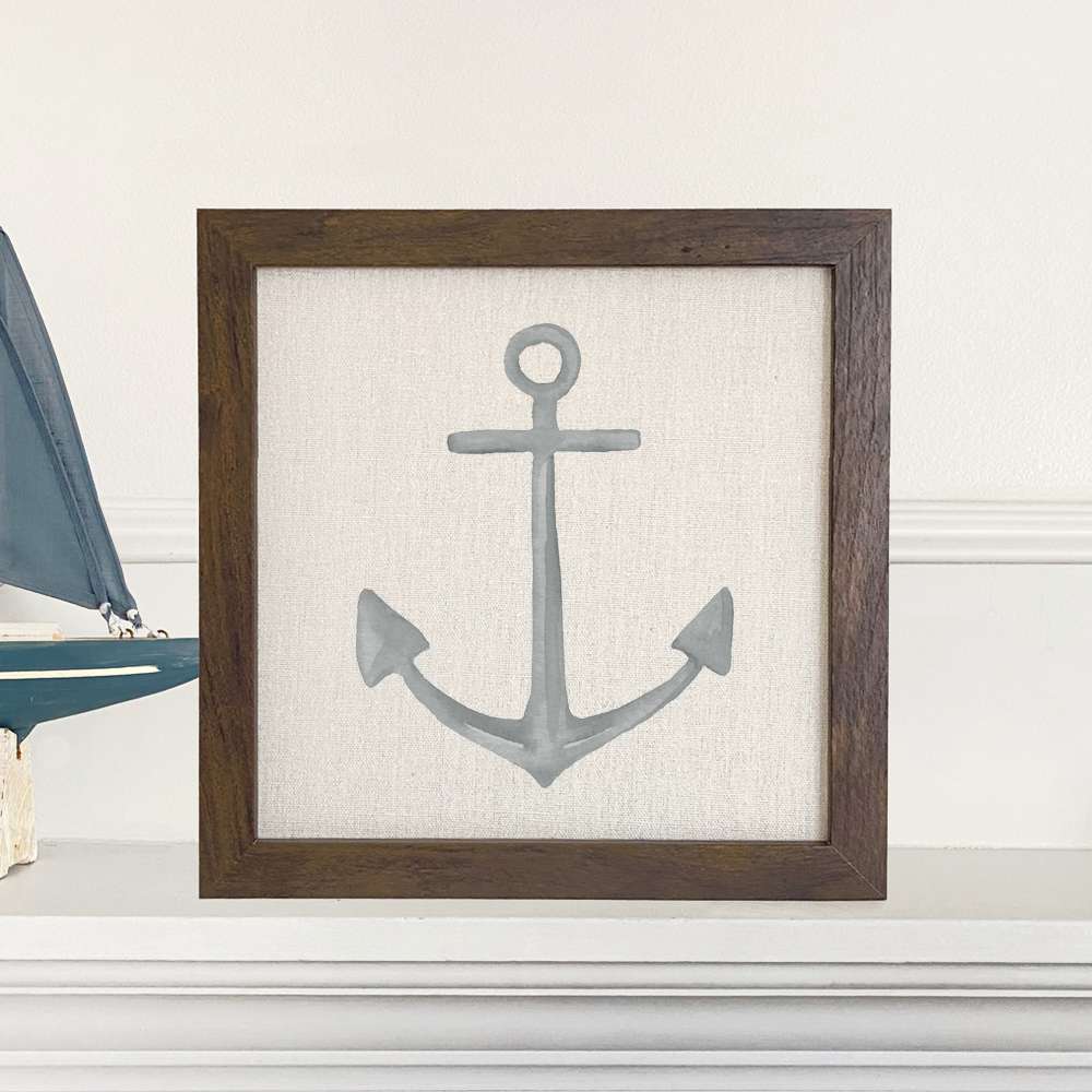 Stylish Anchor Framed Sign with wood frame and linen-look background, perfect for home decor.