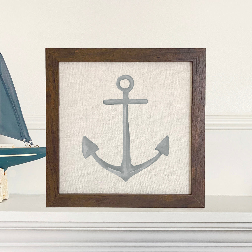 Stylish Anchor Framed Sign with wood frame and linen-look background, perfect for home decor.