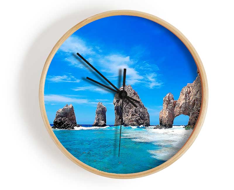 A stylish bamboo clock with a round face, available in black, white, and natural frame colors, featuring a clear Plexiglas lens.