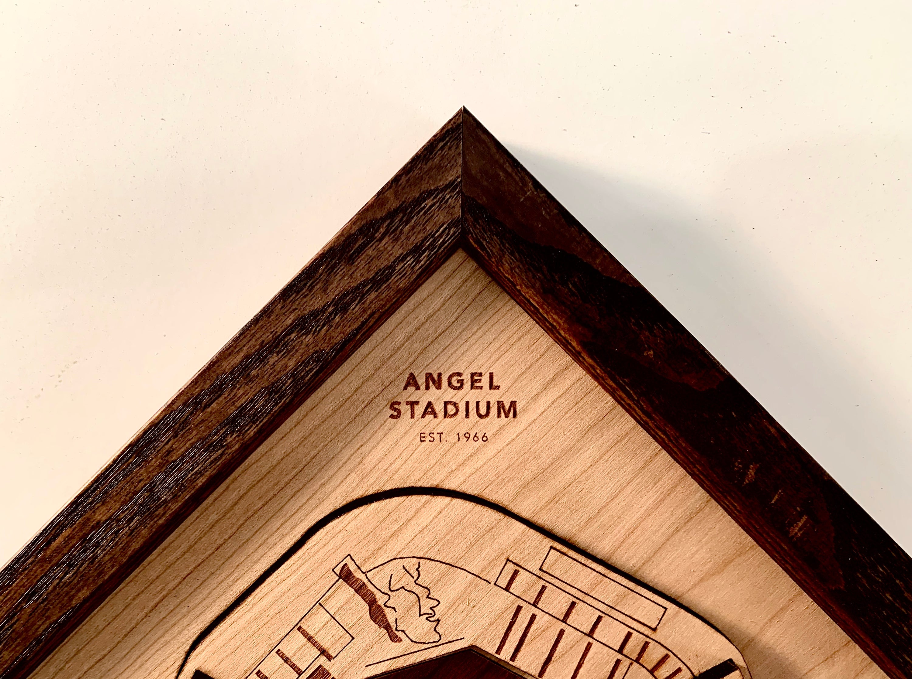 Angel Stadium wall art made from premium hardwoods, featuring intricate laser-cut design and a black walnut frame, ready to hang.