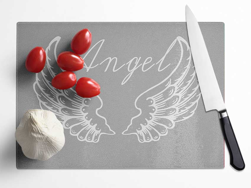 Angel Wings 4 Grey White chopping board made of tempered glass with chinchilla ripple effect and anti-slip feet.