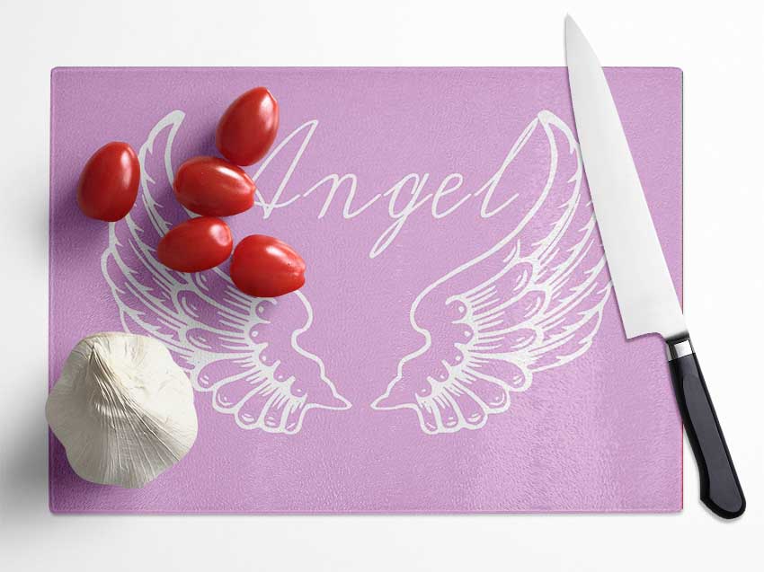 Angel Wings 4 Pink chopping board made from tempered glass with a stylish pink design and anti-slip feet.