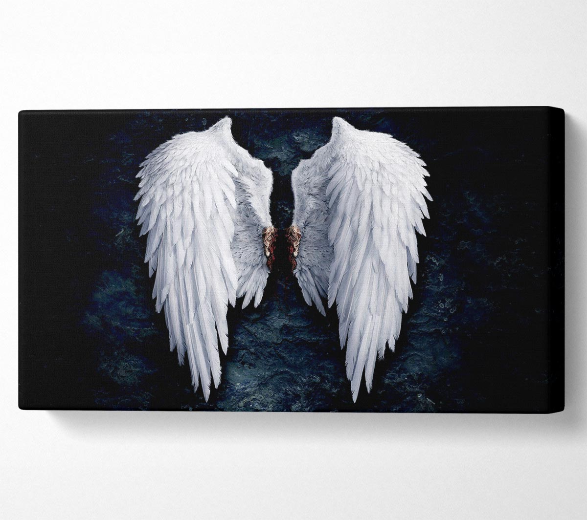 A beautifully printed canvas of angel wings mounted on a sturdy frame, ready to hang.