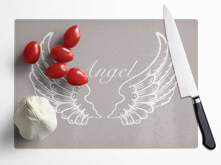 Angel Wings Beige chopping board made from tempered glass with a chinchilla ripple effect and anti-slip feet.