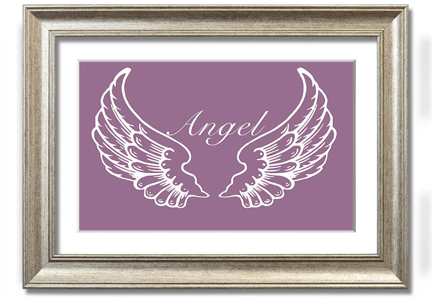 A beautifully framed print of angel wings in dusty pink, showcasing elegant design and craftsmanship.