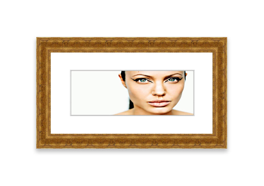 Framed print of Angelina Jolie with cat-like eyes, showcasing her iconic features in a stylish frame.