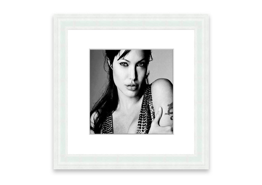 Framed print of Angelina Jolie's dragon tattoo, showcasing intricate details and vibrant colors, available in various frame colors.