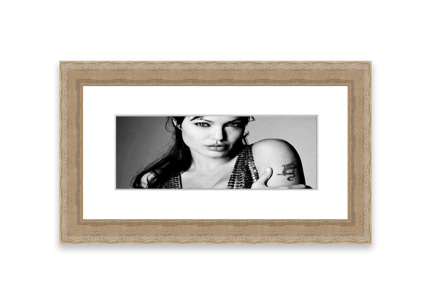 Framed print of Angelina Jolie's dragon tattoo, showcasing intricate details and vibrant colors, available in various frame colors.