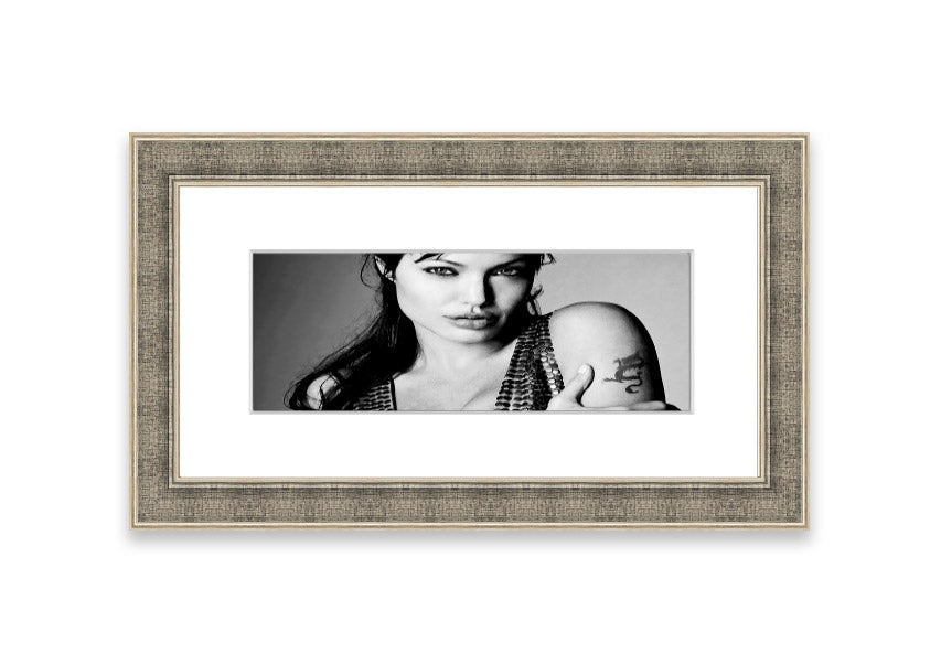 Framed print of Angelina Jolie's dragon tattoo, showcasing intricate details and vibrant colors, available in various frame colors.