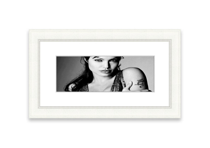 Framed print of Angelina Jolie's dragon tattoo, showcasing intricate details and vibrant colors, available in various frame colors.