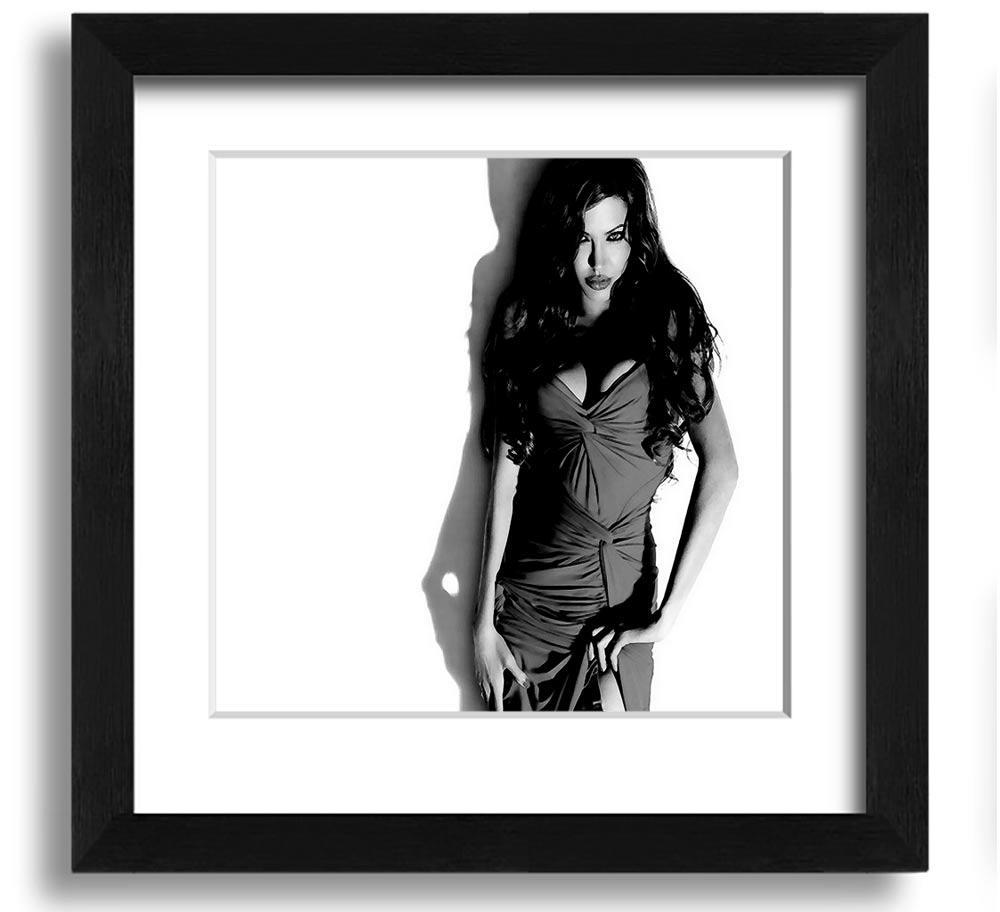 Framed print of Angelina Jolie in a stylish black and white dress, showcasing elegance and sophistication.