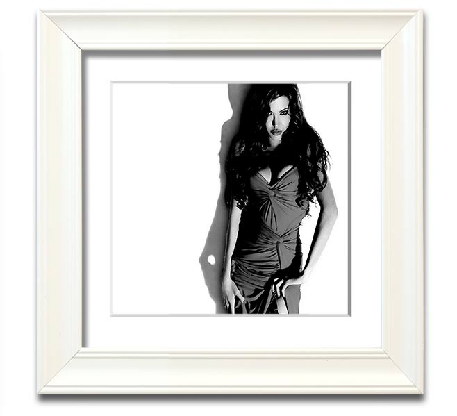 Framed print of Angelina Jolie in a stylish black and white dress, showcasing elegance and sophistication.