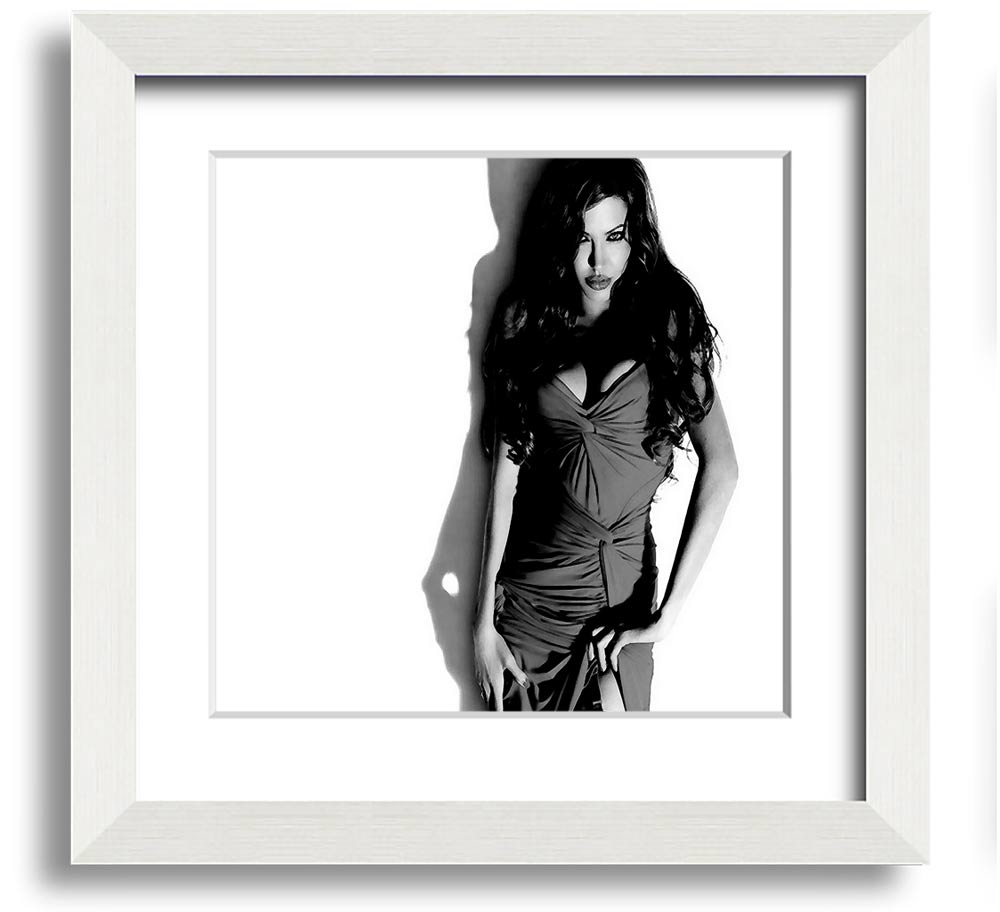 Framed print of Angelina Jolie in a stylish black and white dress, showcasing elegance and sophistication.