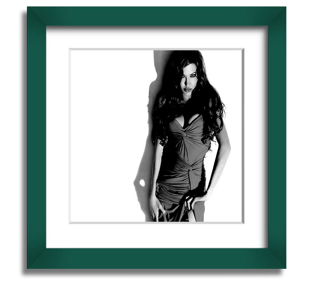 Framed print of Angelina Jolie in a stylish black and white dress, showcasing elegance and sophistication.