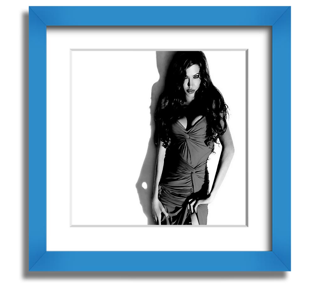 Framed print of Angelina Jolie in a stylish black and white dress, showcasing elegance and sophistication.