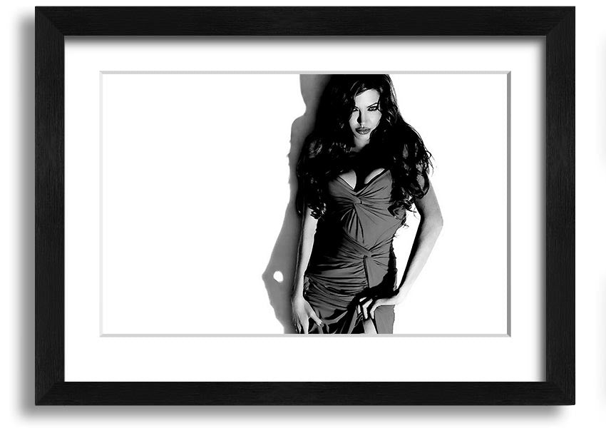 Framed print of Angelina Jolie in a black and white dress, showcasing elegance and style, available in multiple frame colors.