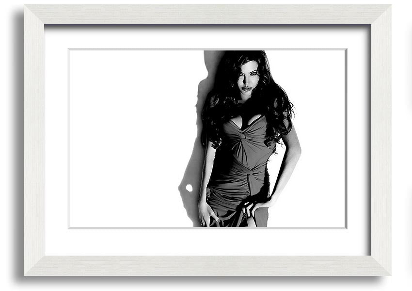 Framed print of Angelina Jolie in a black and white dress, showcasing elegance and style, available in multiple frame colors.